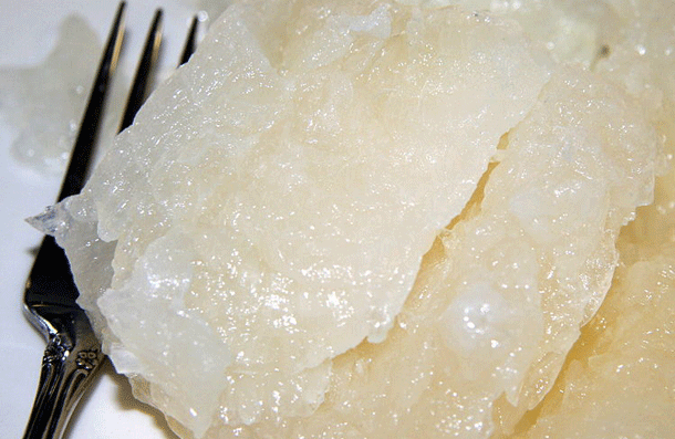 Lutefisk: Usually eaten in Scandinavia this delicacy is made from aged stockfish and lye. Yes, lye. The corrosive alkaline substance also known as caustic soda is used to soak the fish for several days. After being removed from the lye the fish is so corrosive that it requires almost a week long bath of cold water just to become edible again.