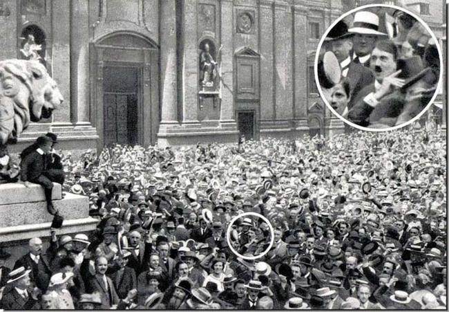 1914 - Young Adolf Hitler celebrating the announcement of World War One.