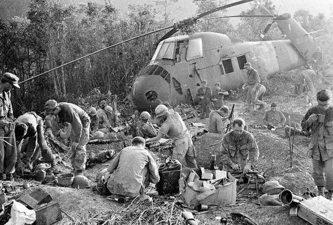 U.S. troops begin their day in a daze after a third night of fierce fighting against North Vietnamese forces.