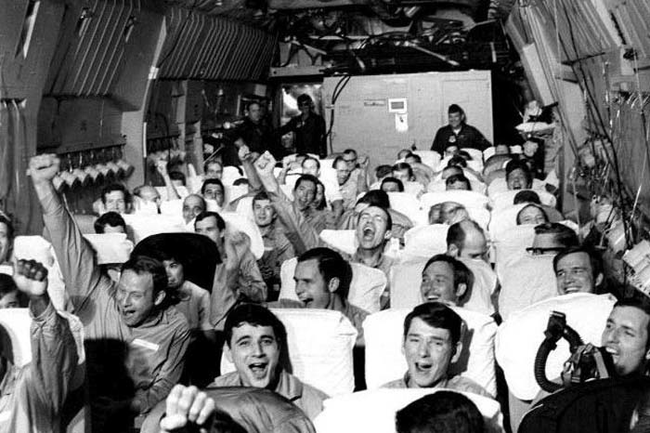 American POWs heading home from Vietnam as their plane finally lifts off.
