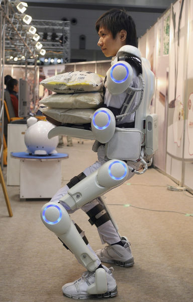 This exoskeleton suit is commercially avaialble in Japan. When a person attempts to move their body, nerve signals are sent from the brain to the muscles through the motor neurons, moving the musculoskeletal system. When this happens, small biosignals can be detected on the surface of the skin. The HAL suit registers these signals through a sensor attached to the skin of the wearer. Based on the signals obtained, the power unit moves the joint to support and amplify the wearers motion. The HAL suit possesses a cybernic control system consisting of both a user-activated voluntary control system" named Cybernic Voluntary Control CVC and a robotic autonomous control system" named Cybernic Autonomous Control CAC" for automatic motion support.