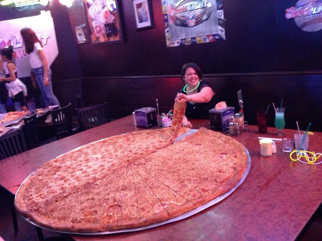 Pizza at Big Lou, Texas 1 topping giant pizza is about 60