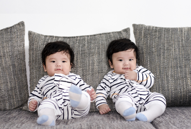 The likelihood of having twins varies around the globe.  In Nigeria, odds of having twins are 22-1. The West-African region is particularly prone to twins. In Japan, however, the odds are 200-1. If you don't think this is disconcerting, you clearly haven't thought about the logistical horror that is raising a pair of twins, and the obvious conclusion we can all reach that babies are globally conspiring to burden certain parts of the world with this albeit adorable horror.