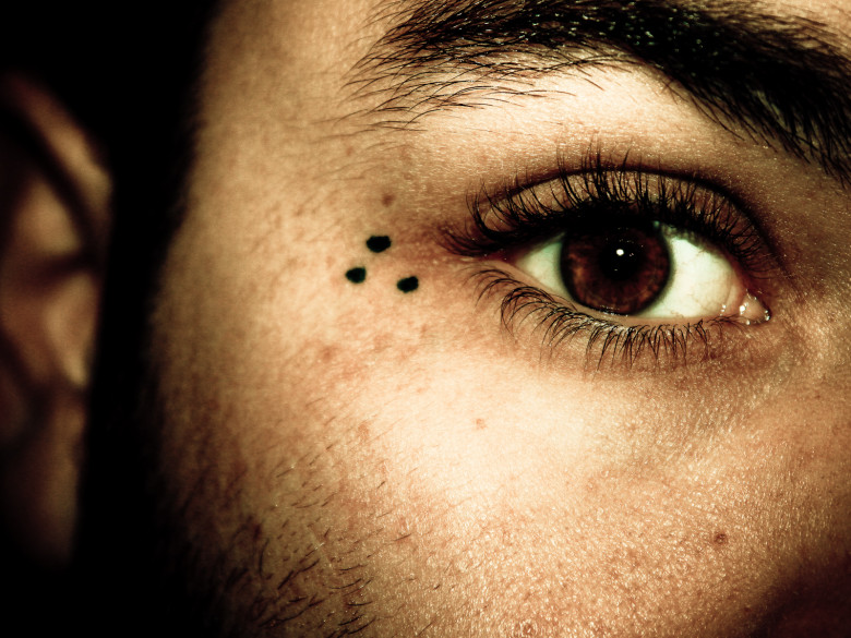 Three Dots On The Eyes - There is no particular gang that this is affiliated with but it is a tattoo that represents the gang life and is usually found on the eye or the hand.