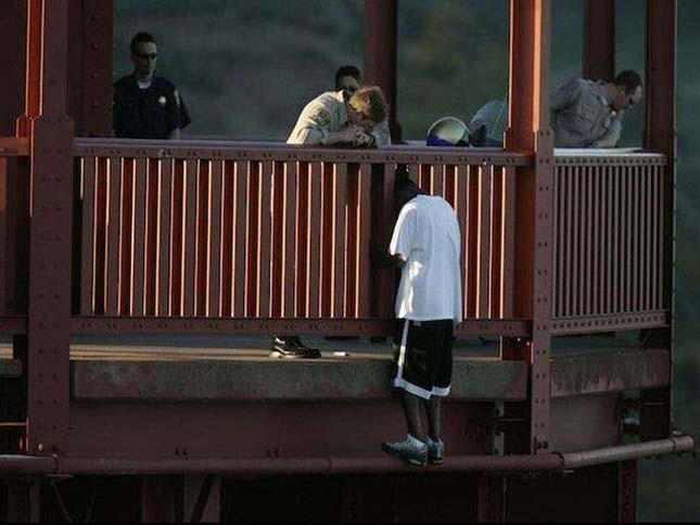 Kevin Berthia is talked out of jumping off the Golden Gate Bridge by police officers.
