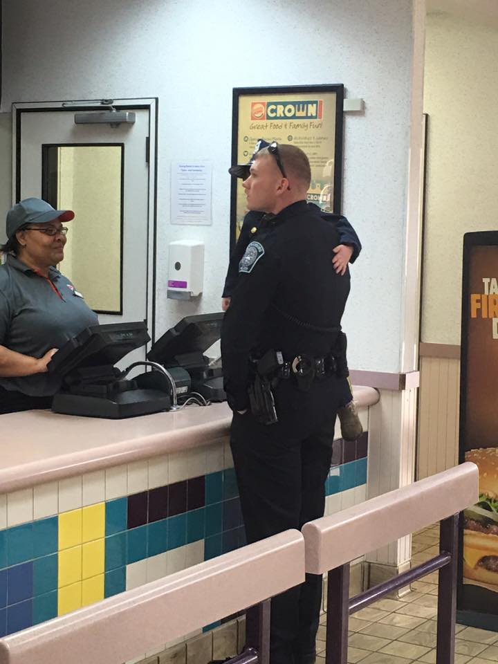 Cop Picks Up This Little Girl And Waits For Order, But When They Turn...