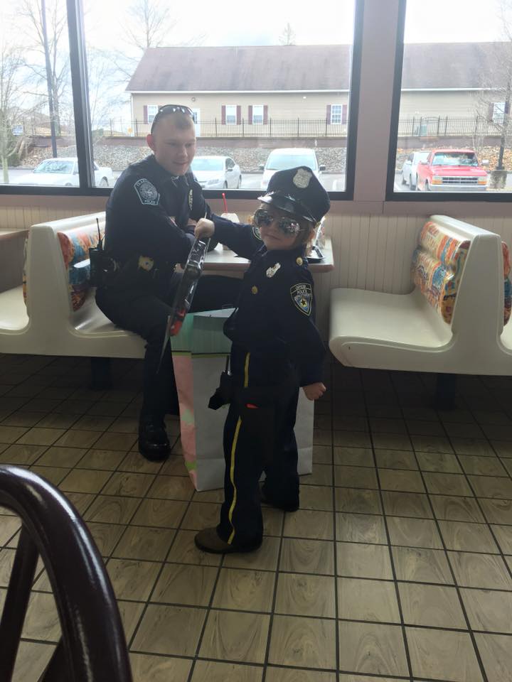 Cop Picks Up This Little Girl And Waits For Order, But When They Turn...