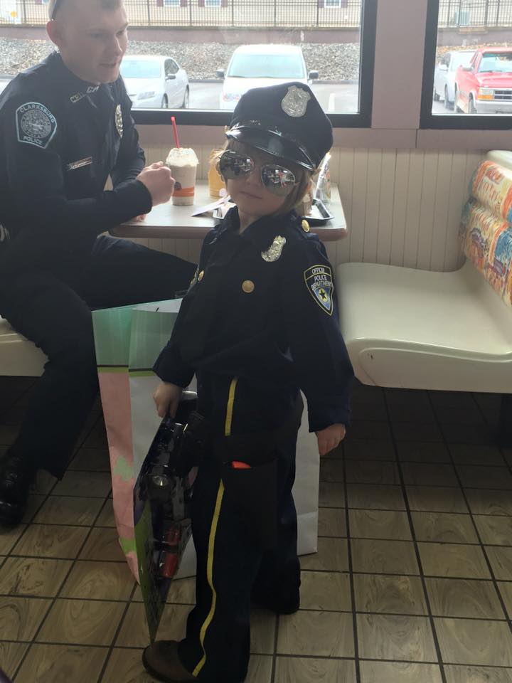 Cop Picks Up This Little Girl And Waits For Order, But When They Turn...