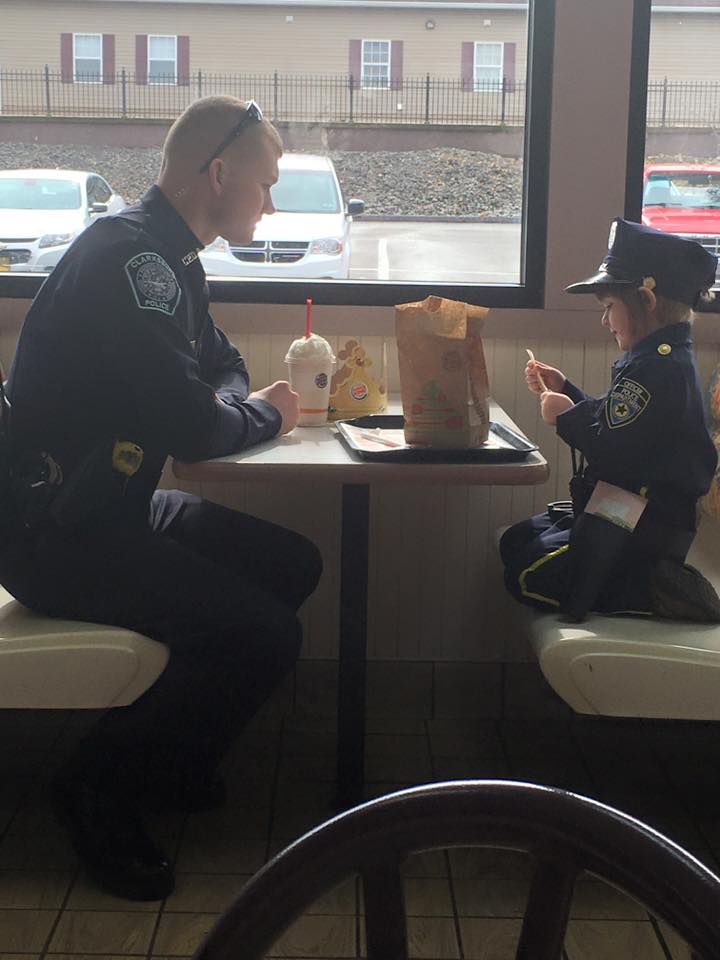 Cop Picks Up This Little Girl And Waits For Order, But When They Turn...