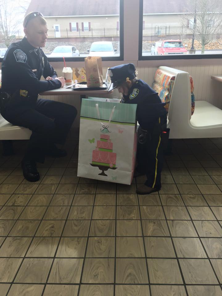 Cop Picks Up This Little Girl And Waits For Order, But When They Turn...