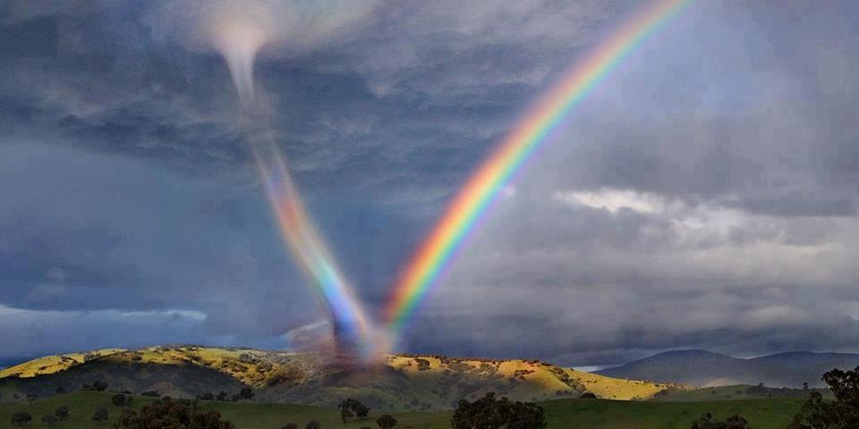 tornado sucking up rainbow