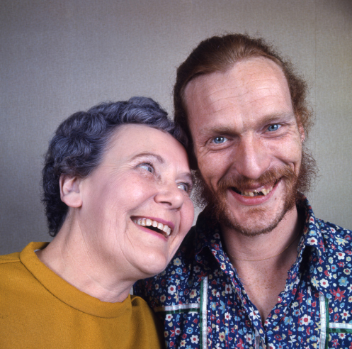 Ginger Baker, the Cream and Blind Faith drummer, flashes a rare smile with his mother Ruby Streatfield inside her rowhouse in Bexley, outside London, in 1970.