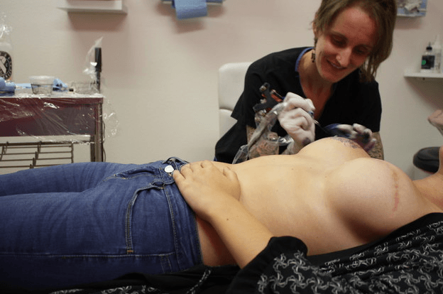 She contacted Holly Feneht who is a specialist in helping patients cover post op scars, and is an expert in post mastectomy tattoos.