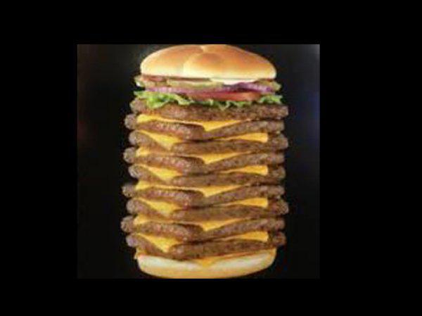 4. Wendy’s Triple, 1030 Calories
Another meat maniac, three square patties stacks up to over a thousand calories, without the fries.
