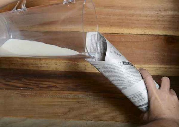 Have you ever seen that trick where someone pours milk into a rolled up newspaper and it magically disappears? Have you ever wondered how it's done? Fear not because the secret behind this common magic trick is about to be revealed.