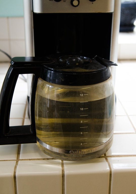 Coffee maker:
When your coffee starts to taste funky, it's time to give it a thorough clean. Here's how: fill your water chamber with half water, half vinegar. Then run a half-brew cycle (no coffee grounds) and let it sit for an hour. An hour later, finish the brew cycle. Empty your coffee pot and then run a fresh water cycle and repeat a few times until you can no longer smell the vinegar.