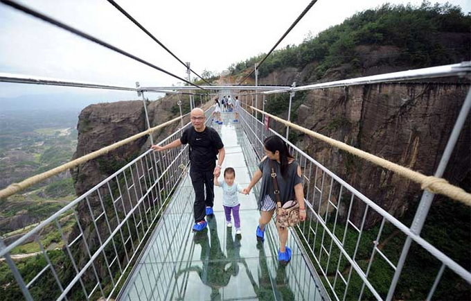 The glass panes forming the footpath are said to be 25 times stronger than regular window glass. They're also created to stay in shape and withstand impact although special footwear has been issued to visitors.
