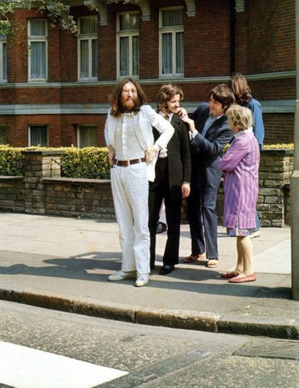 The Beatles preparing to cross Abbey Road