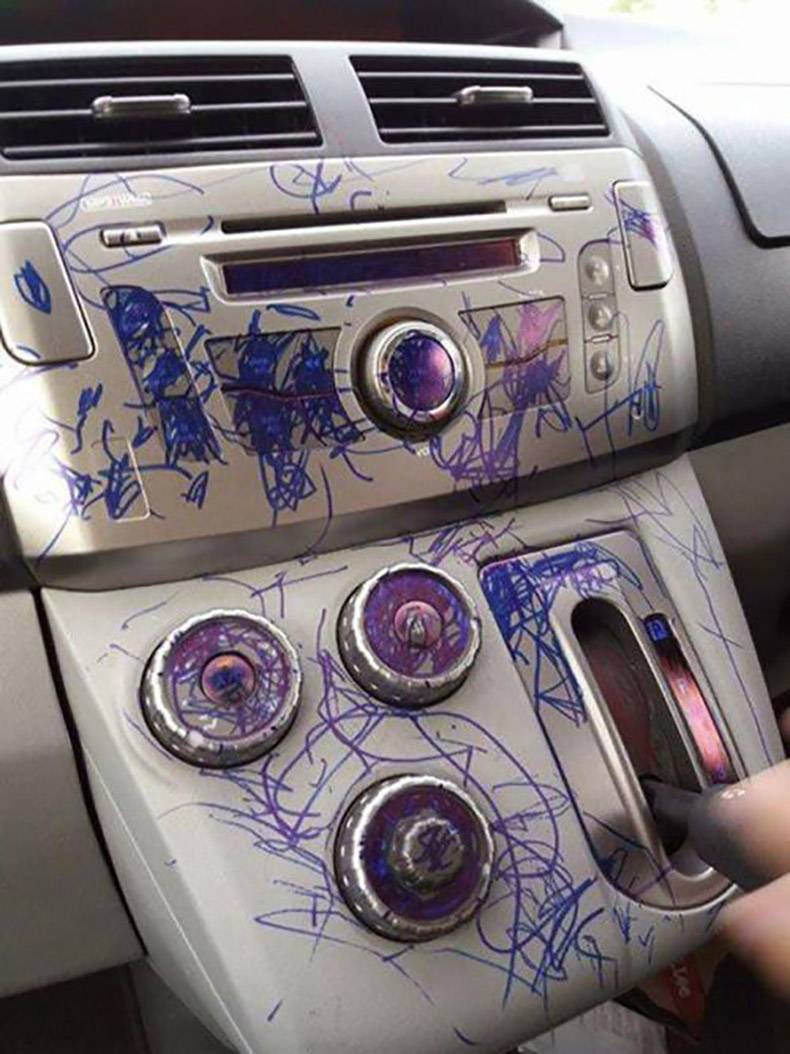 Disaster photo of letting a kid doodle on your car's interior.