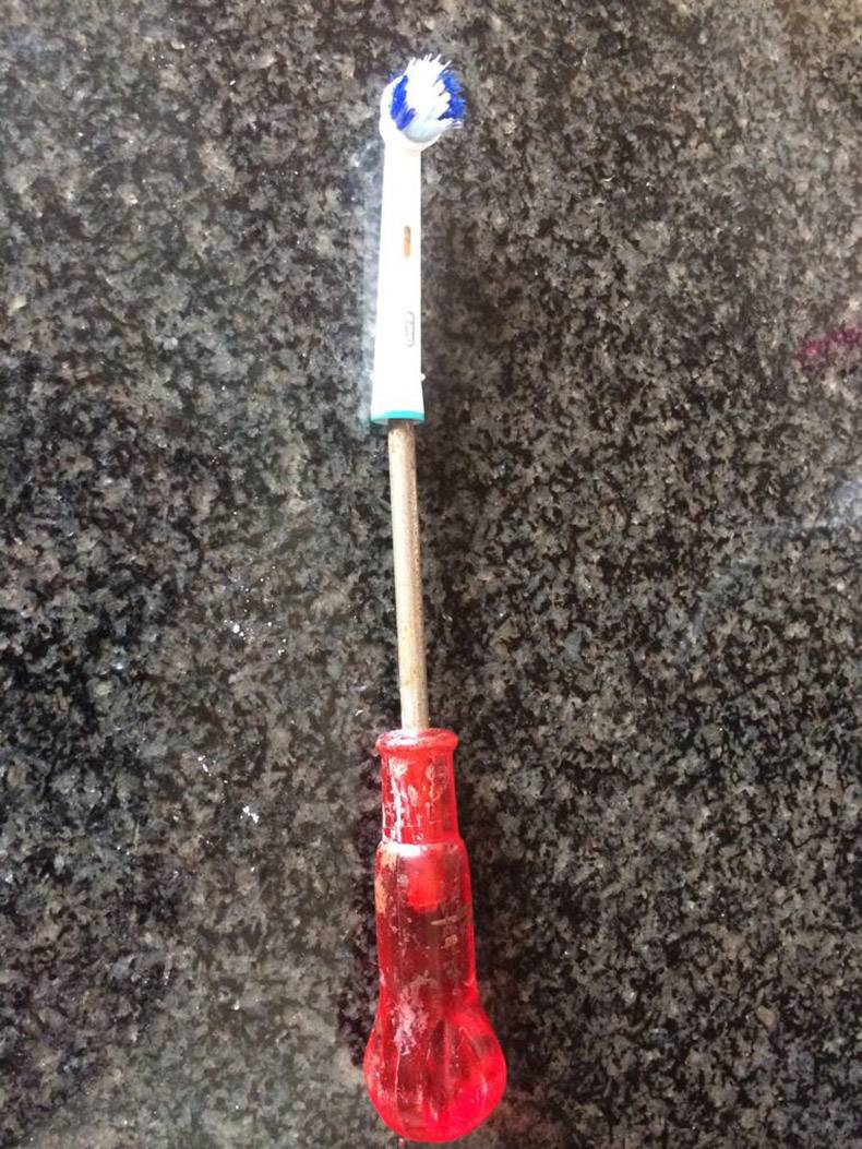 Screwdriver modified into a toothbrush.