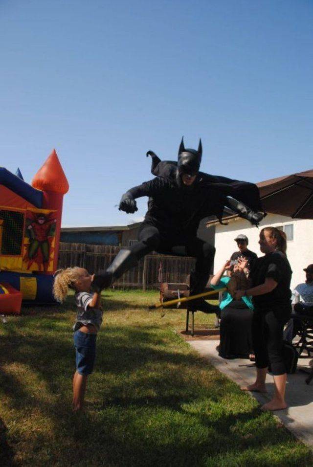 batman begins kicking kids in the face