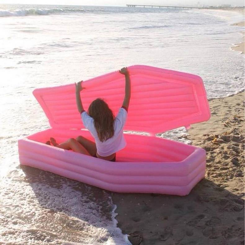 Amusing Pictures - pink coffin pool float