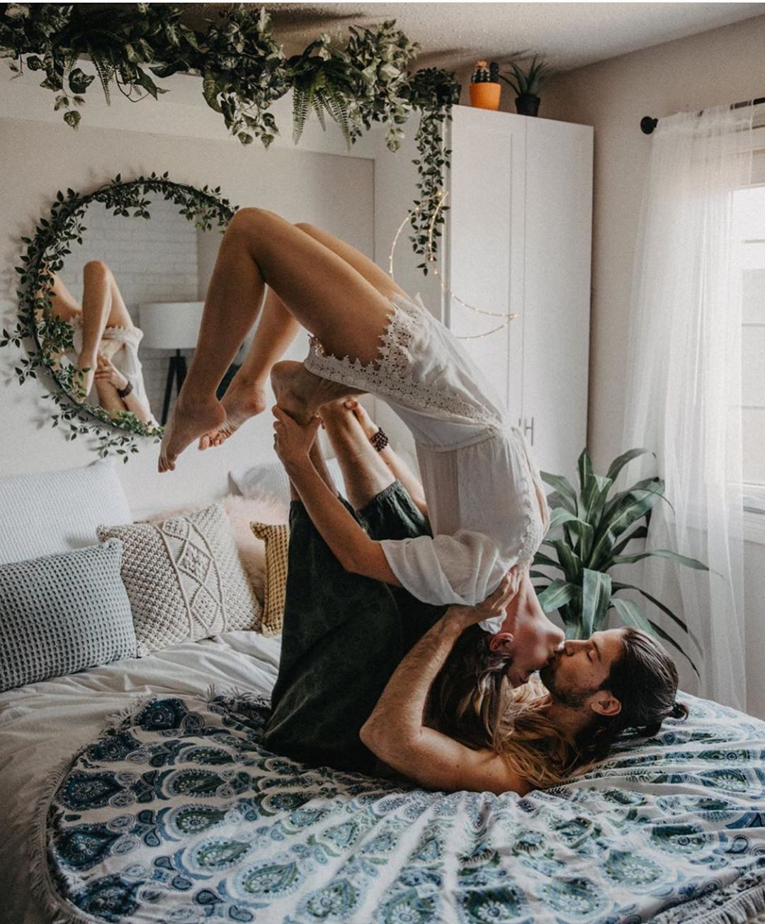 couple adorable home yoga kissing