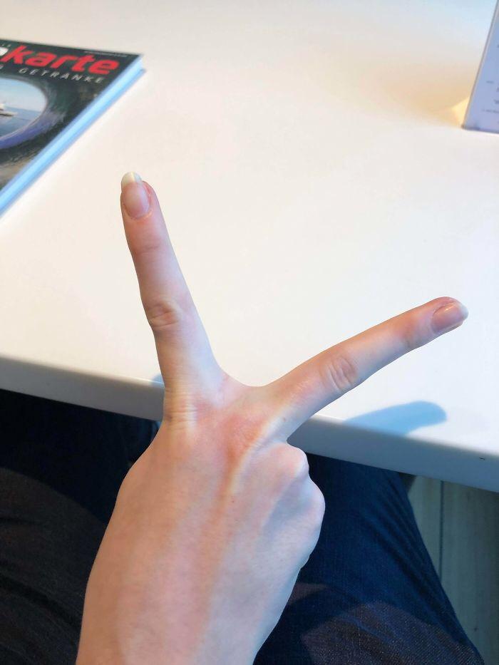 peace sign long fingers
