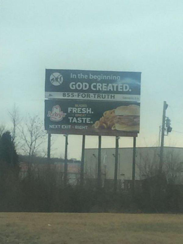billboard - In the beginning God Created. 855ForTruth Fresh Taste. Next Exit Right