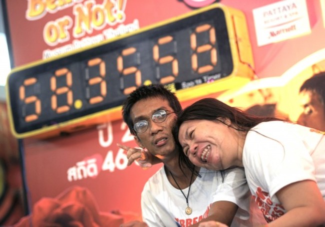 This couple can out-kiss you.
This is Thailand's Ekkachai and Laksana Tiranarat. In 2013 they made history by kissing for 58 hours, 35 minutes, and 58 seconds at a Ripley’s Believe It Or Not Event and are currently the world record holders for World's Longest Kiss.