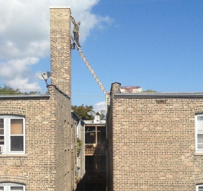 When this guy's ladder was juuuuuust long enough