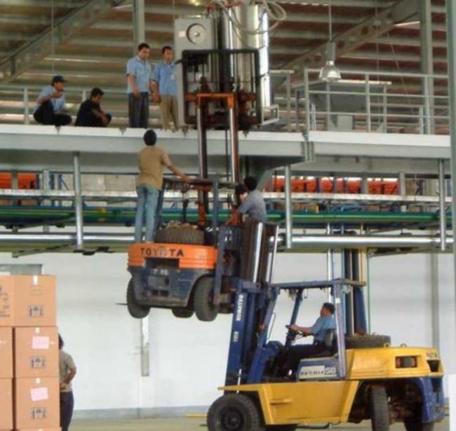 When these guys liked forklifts so much that they put a forklift on their forklift