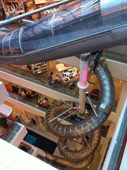 A mall in China has a slide that takes riders from the top floor to the bottom... I don't think this would work if you made a lot of purchases XD