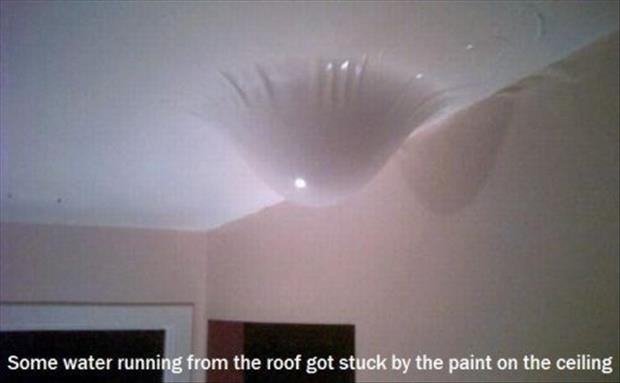 ceiling - Some water running from the roof got stuck by the paint on the ceiling