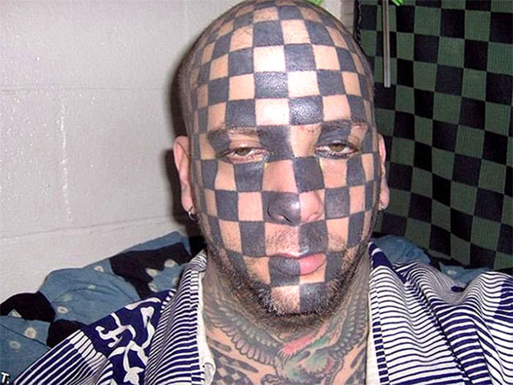 Don't get the checkerboard camouflage tat... checker's are so last year. Everyone's playing pie face now, plan accordingly.