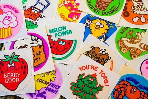 Trading stickers for your album at recess (puffy stickers, scratch and sniff, hologram)