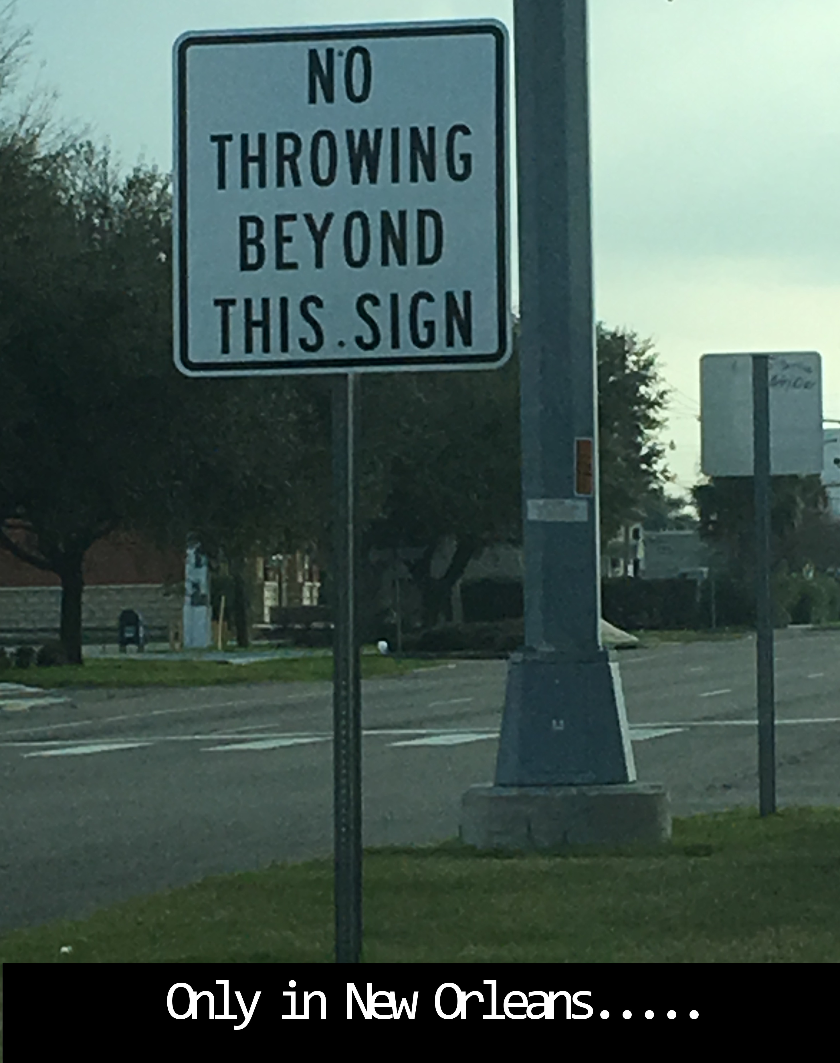 New Orleans sign saying No Throwing Beyond This Sign