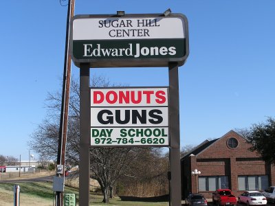 street sign - Sugar Hill Center Edward Jones Donuts Guns PaySCHO24