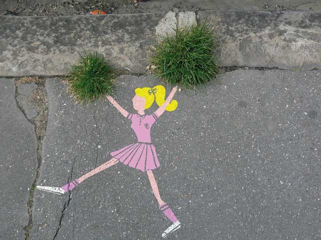 Little sprouts of grass drawn as cheerleader street art.
