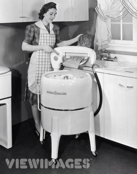 On top of mothering and cooking, women had to figure out how to use this thing- they survived!