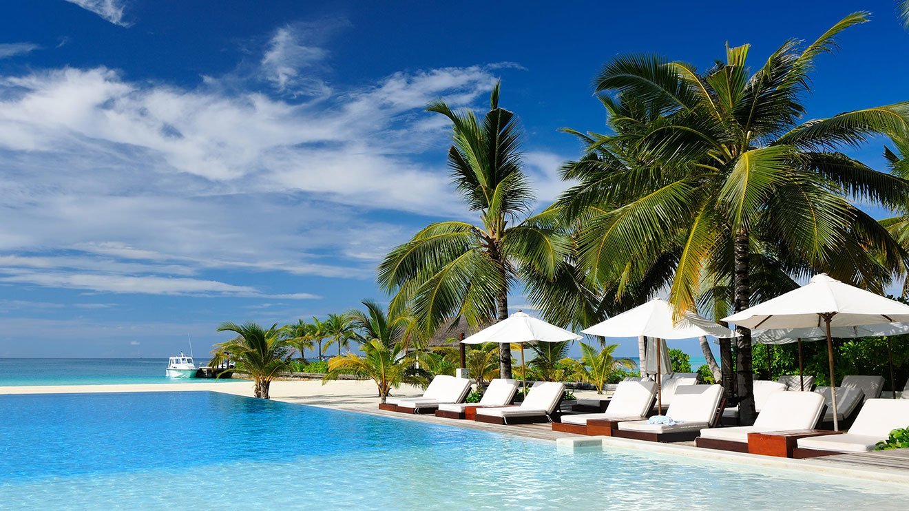 Perhaps a midday lounge in this gorgeous tropical resort, with the breeze gentle rustling your hair