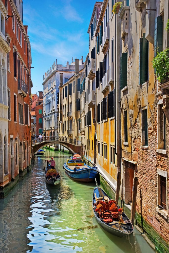 Can you hear the gondolas gently moving the water during their mid-day shuttles? The aroma of Italian food wafting from the open windows?