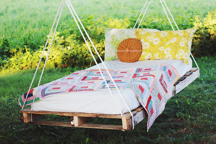 A wooden pallet swing bed with free pallets, you just need the cushion, rope, and muscle