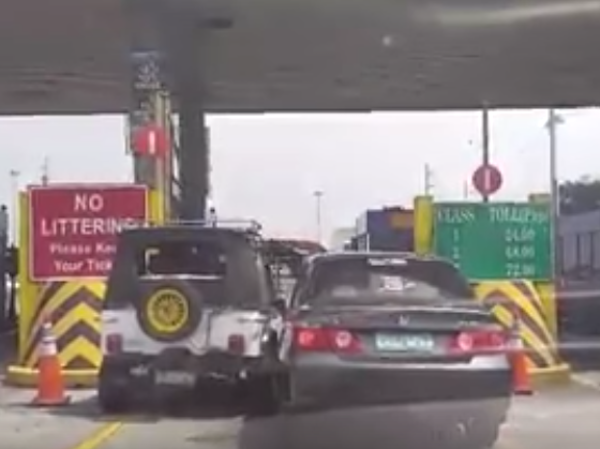 Two cars, one toll booth
