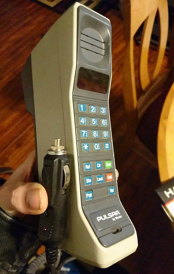 My dad had a phone like this. He carried it in a purse like bag and we made fun of him for it.