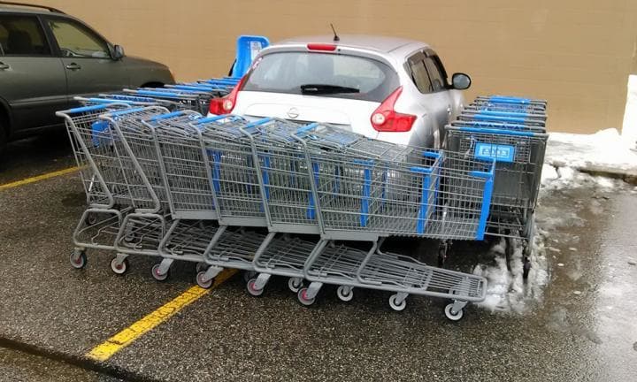 car blocked by shopping carts