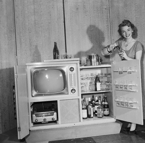 Even back in the old days, they knew the importance of being able to grab a beer and sandwich while watching the tellie