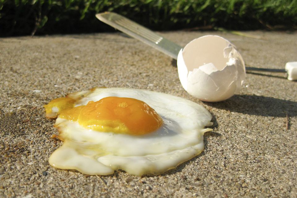 egg frying on sidewalk