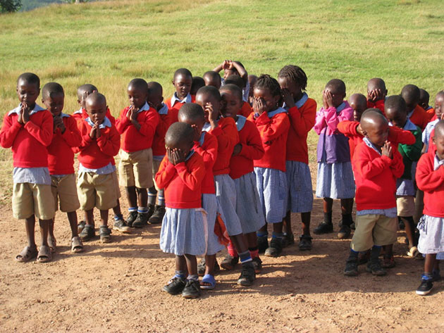 Little ones wait for class in Uganda
