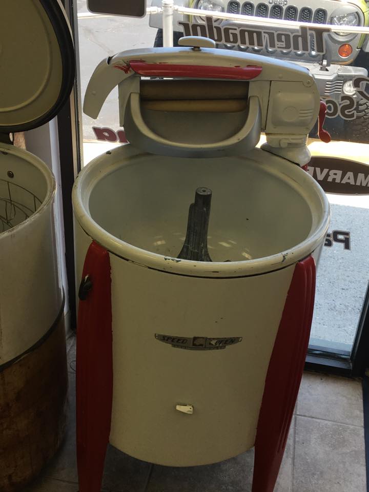 It's either a really old washing machine or an ice cream maker. Either way I'm glad they've come a long way, baby